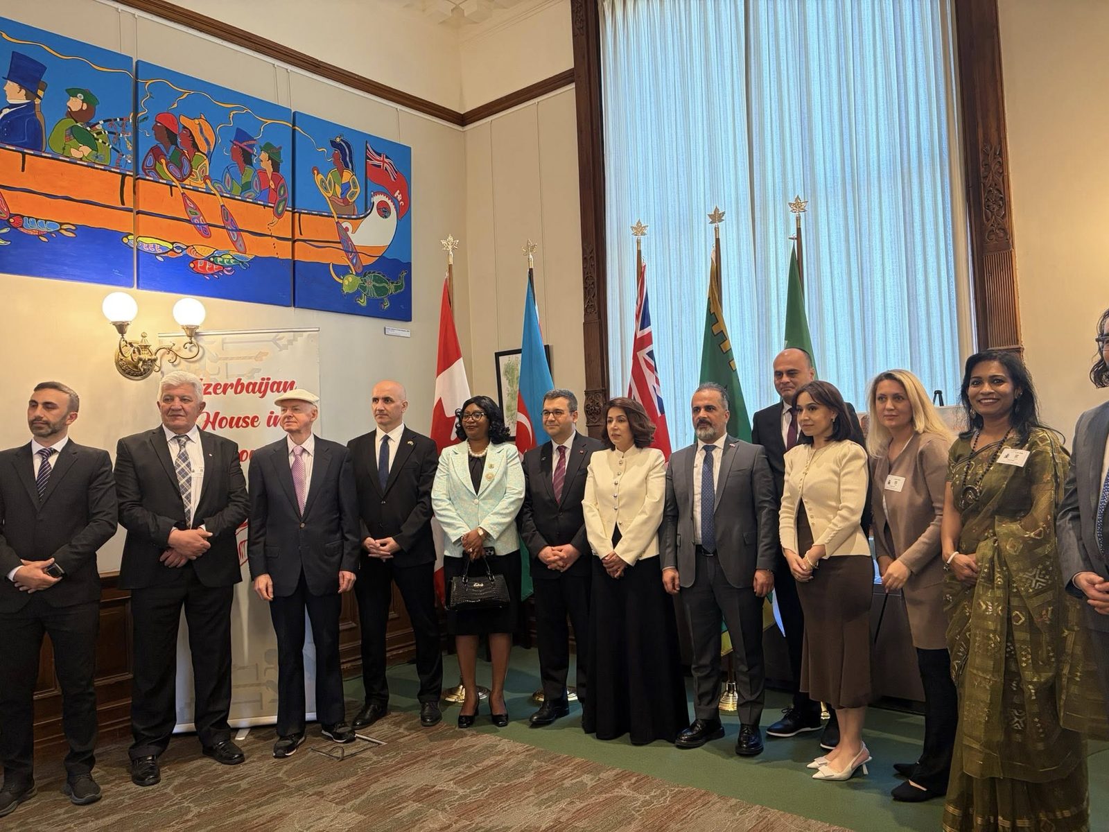 Sharmina meeting community members and public leaders